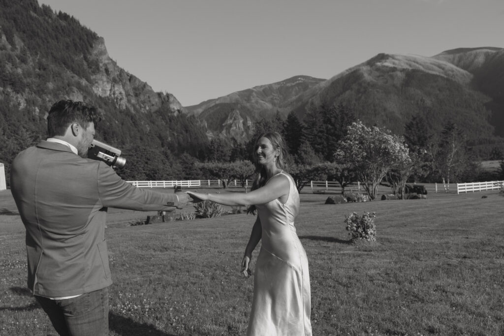 Elopement couple taking Super 8 video of each other.