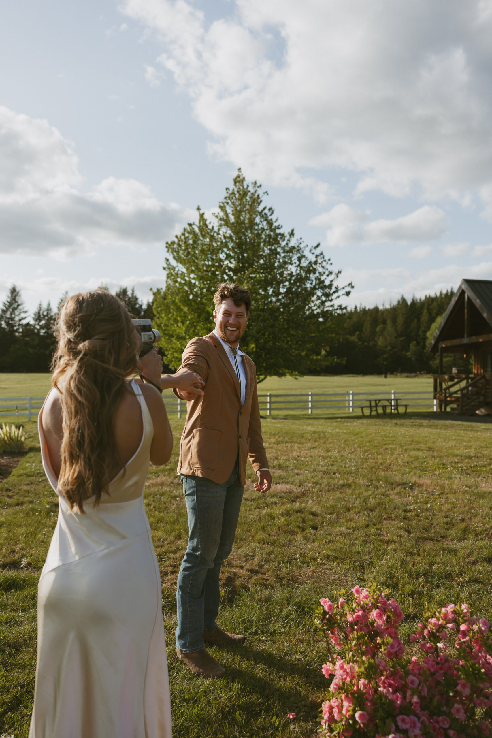 Wedding couple shooting Super 8 footage of each other.