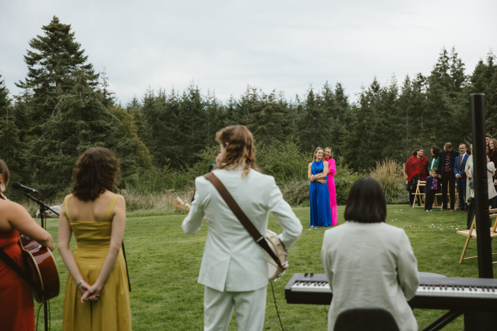 Brides enjoy their live band during their Friday Harbor Wedding ceremony.