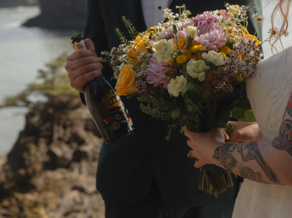 Elopement couple walking the trail at Secret Beach in Brookings, OR