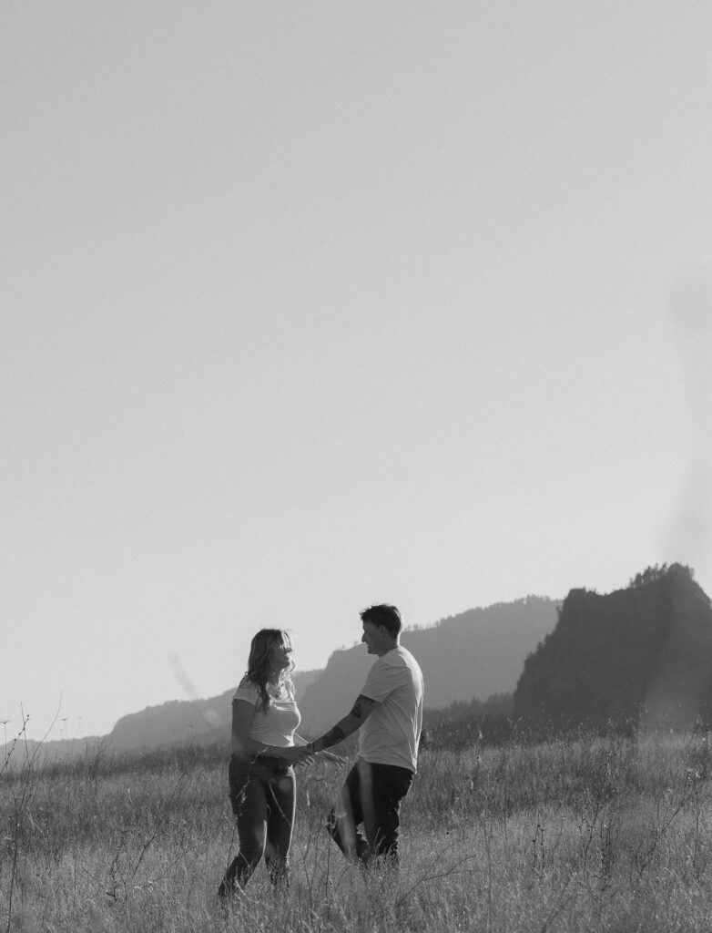 engaged couple playing together in Bonneville, WA
