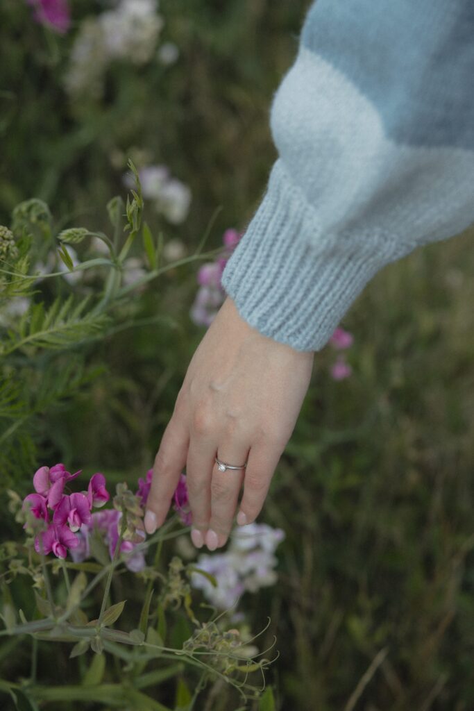 engagement ring and wildflowers in the gorge