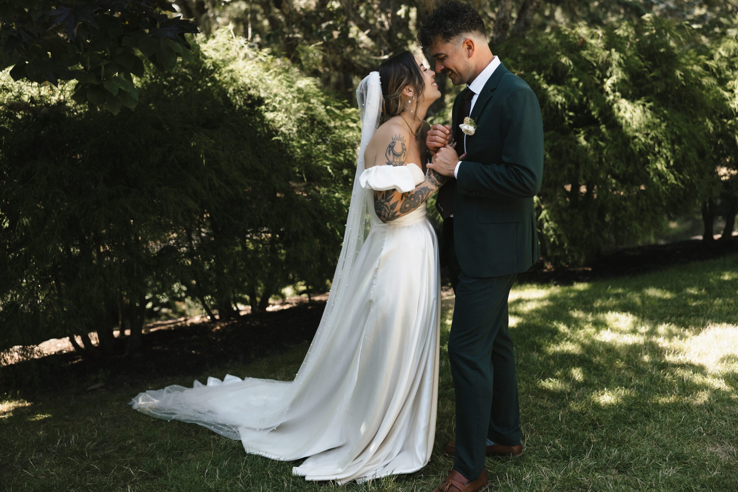 Bride wearing thrifted wedding dress during Mount Tom House celebration