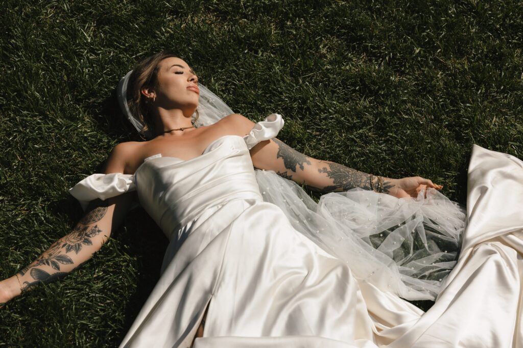 Bride wearing thrifted wedding dress during Mount Tom House celebration