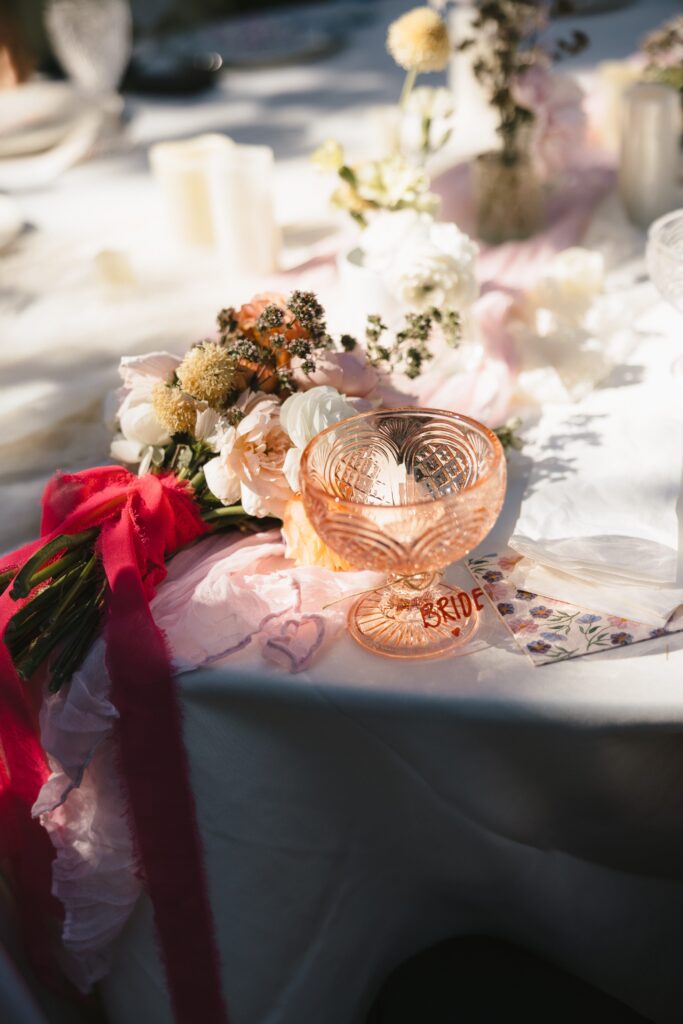 Low waste wedding details including thrifted glassware and decor at Oregon intimate wedding