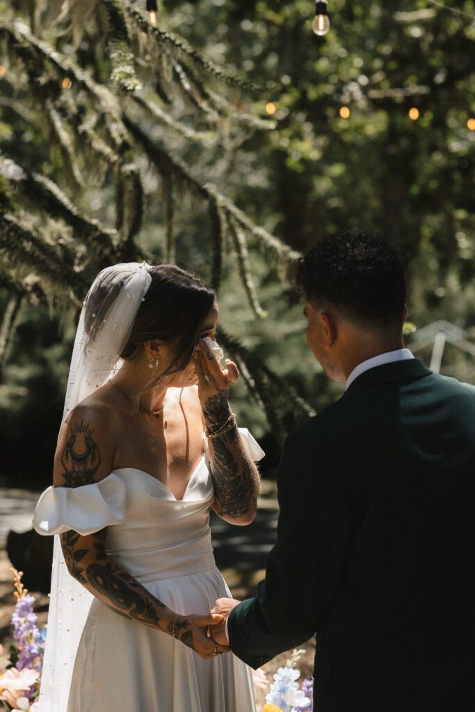 Emotional wedding vows exchanged at Oregon intimate wedding with Levi’s dad officiating