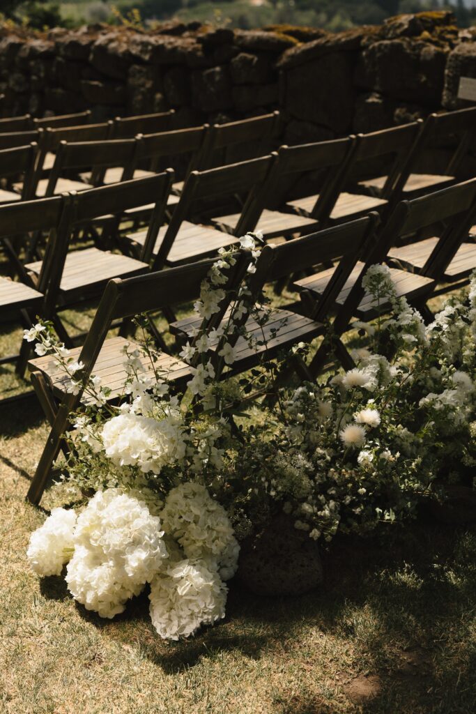 Golden-hour ceremony florals at The Griffin House wedding