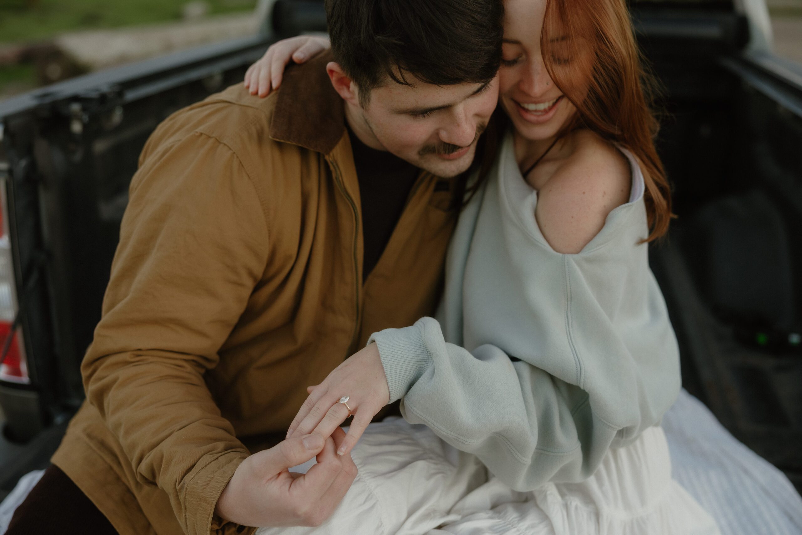Snoqualmie Valley engagement session sitting in a truck bed