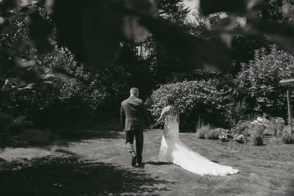 Sammie and Jacob soaking up the quiet moments of their garden backyard wedding