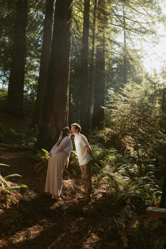 An engagement session in the Redwoods trail at Hoyt Arboretum.