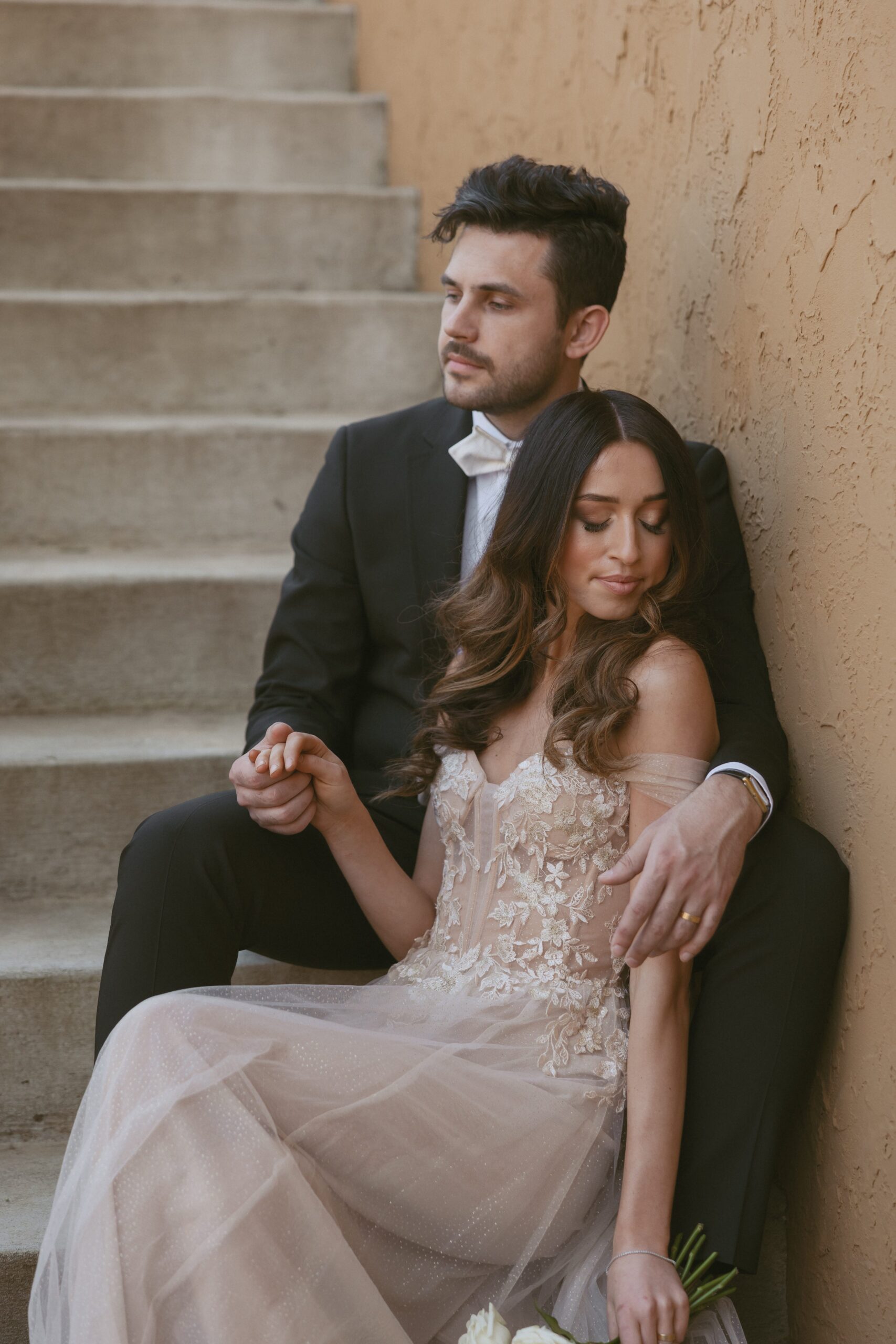 Elopement couple snuggling together